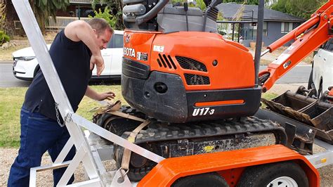 tie down mini excavator|strapping adelaide mini excavators down.